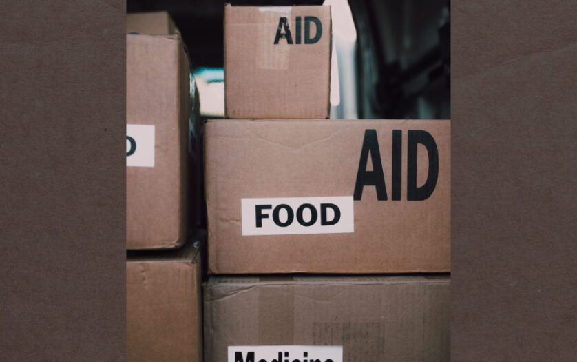 Close-up of aid packages with labels for food and medicine